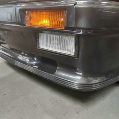 BMW E30 conjunto de molduras de encaixe para farol de nevoeiro.
